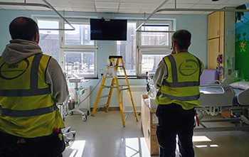 Installation of new televisions on The Childrens Ward, UHW.