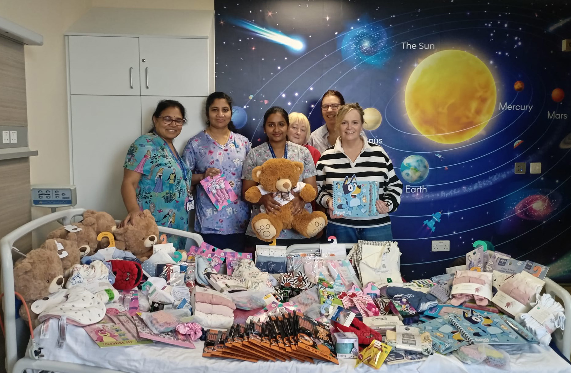 Juniors For Juniors Team Members, Janet and Isobel with help from Penneys Waterford provide important resources to the Children's Ward at UHW